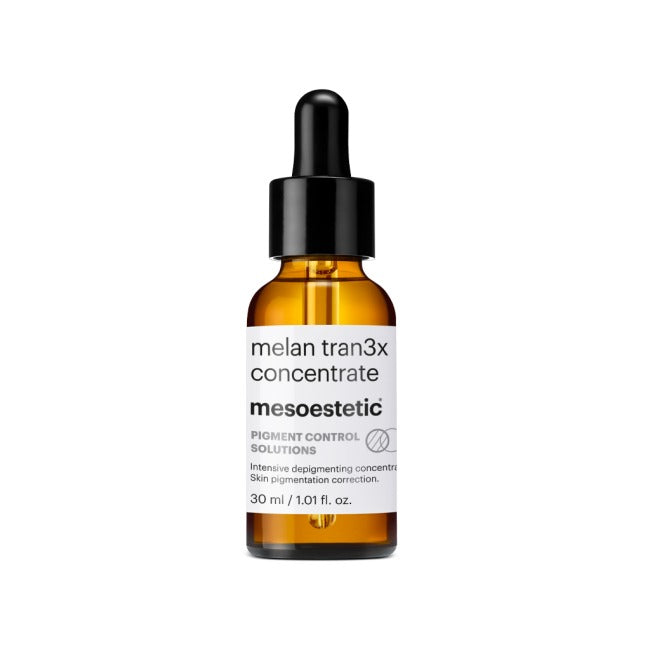 Bottle of melan tran3x concentrate by mesoestetic on a white background