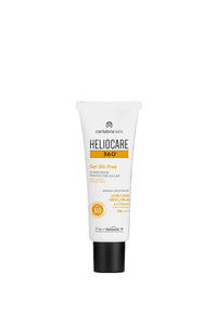 Heliocare 360 sunscreen gel tube on a green background