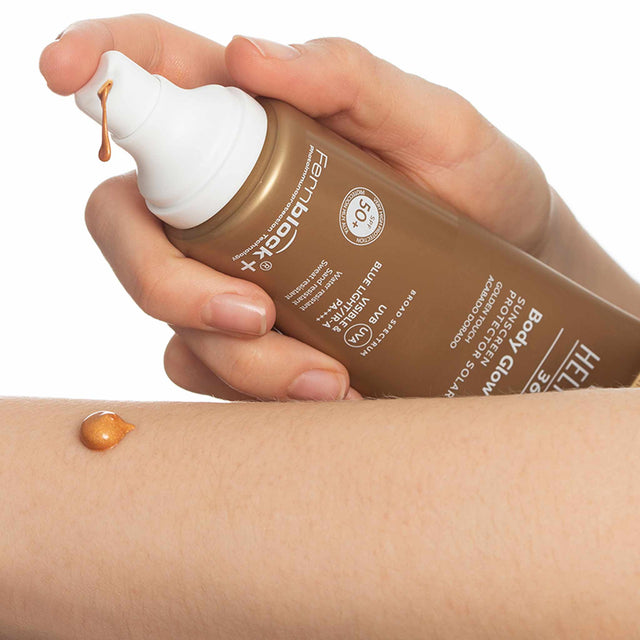 Radiant-finish body sunscreen with SPF 50+, enriched with Vitamin C, E, and Hyaluronic Acid for sun protection, skin nourishment, and hydration.