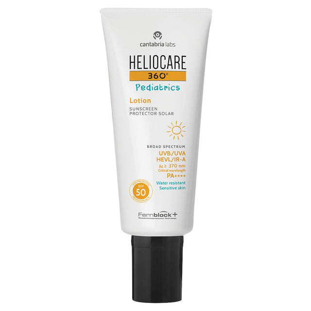 Bottle of baby and child sunscreen lotion with SPF, formulated with Fernblock®+, Vitamin E, and antioxidants for high-level sun protection and sensitive skin care.