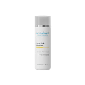 Cleansing milk in a sleek, minimalist bottle formulated with Wheat Proteins, Jojoba Oil, and Calendula to soothe and hydrate sensitive skin.