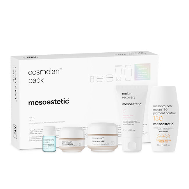 Mesoestetic cosmetic products including a box and various bottles on a white background