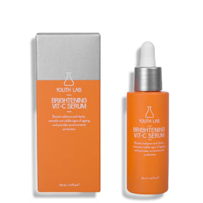 A product image showing a bottle and box of Youth Lab Brightening Vit C Serum. The packaging is primarily orange and white.