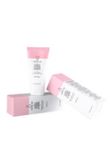 Creamy texture of facemask being applied to clean skin