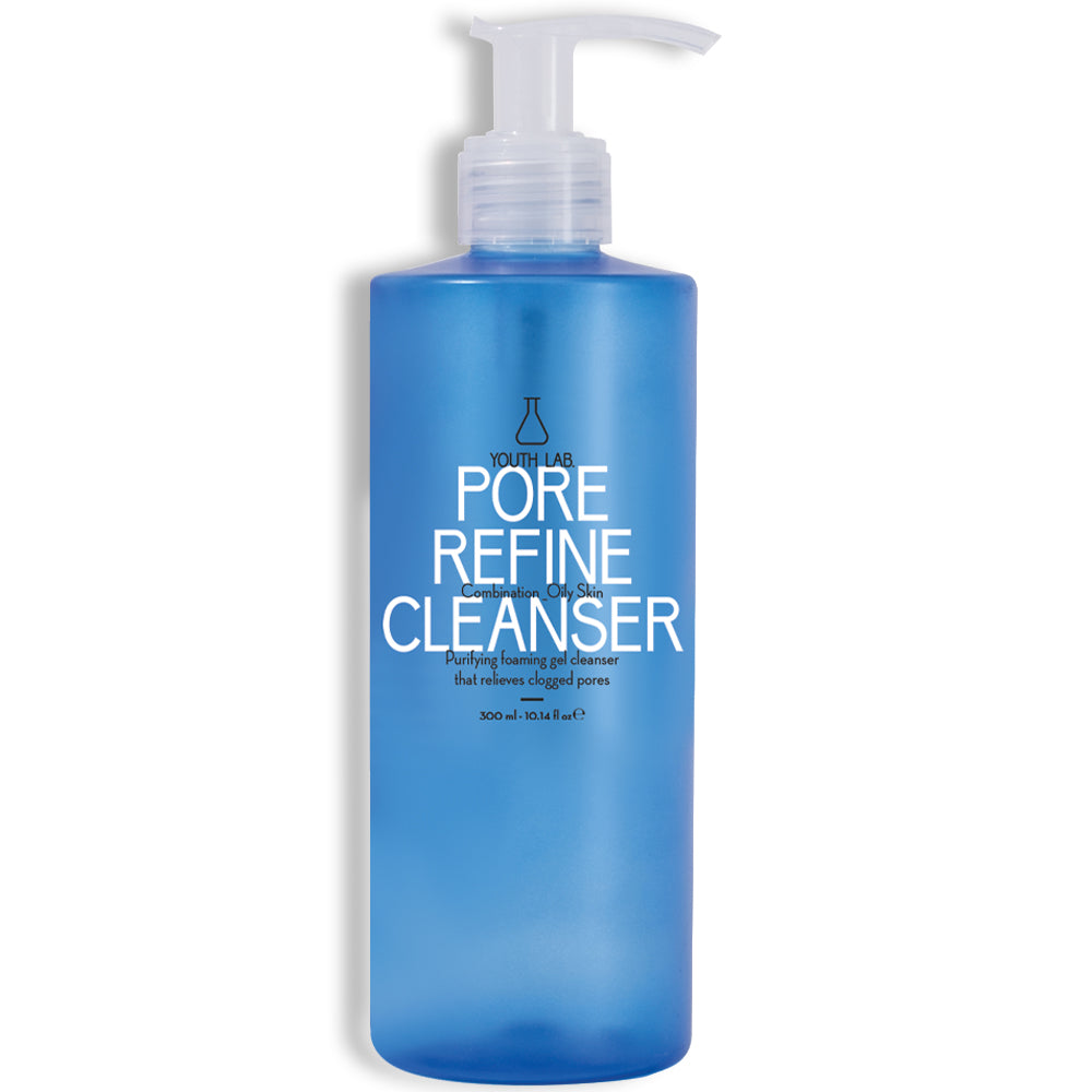 Gentle foaming cleanser in sleek white bottle with pump dispenser, surrounded by water droplets.