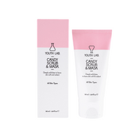 Tube of gentle exfoliating facemask with natural plant elements in the background