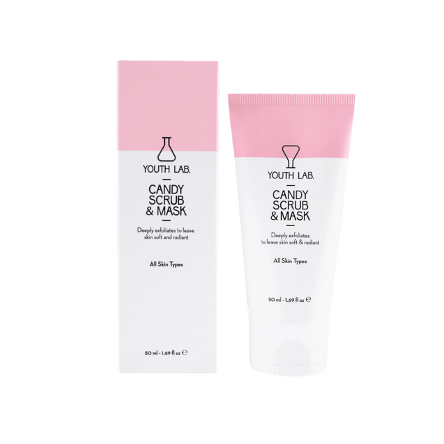 Tube of gentle exfoliating facemask with natural plant elements in the background